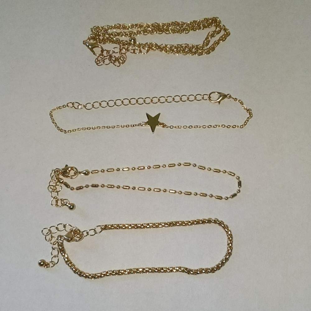Lot of 4 gold tone bracelets